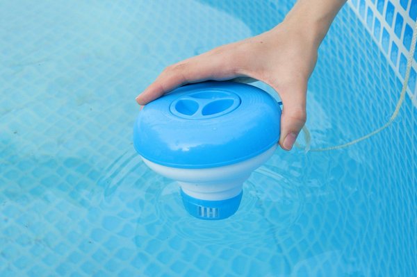 What are the consequences of over chlorination in a UK home swimming pool and how to rectify it?